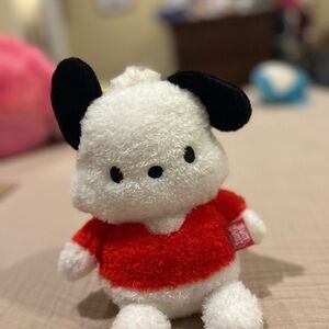 Cute Black and White Stuffed Animal with Red Sweater